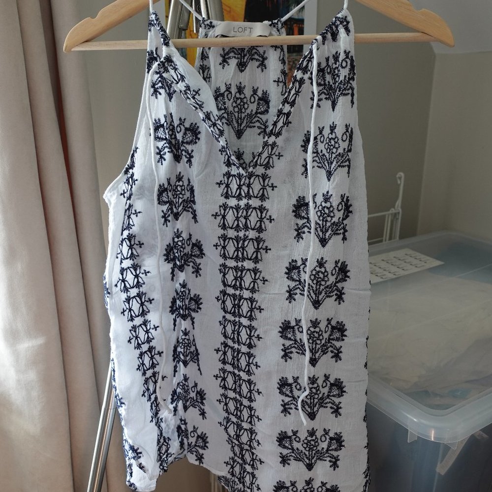 Embroidered sleeveless blouse